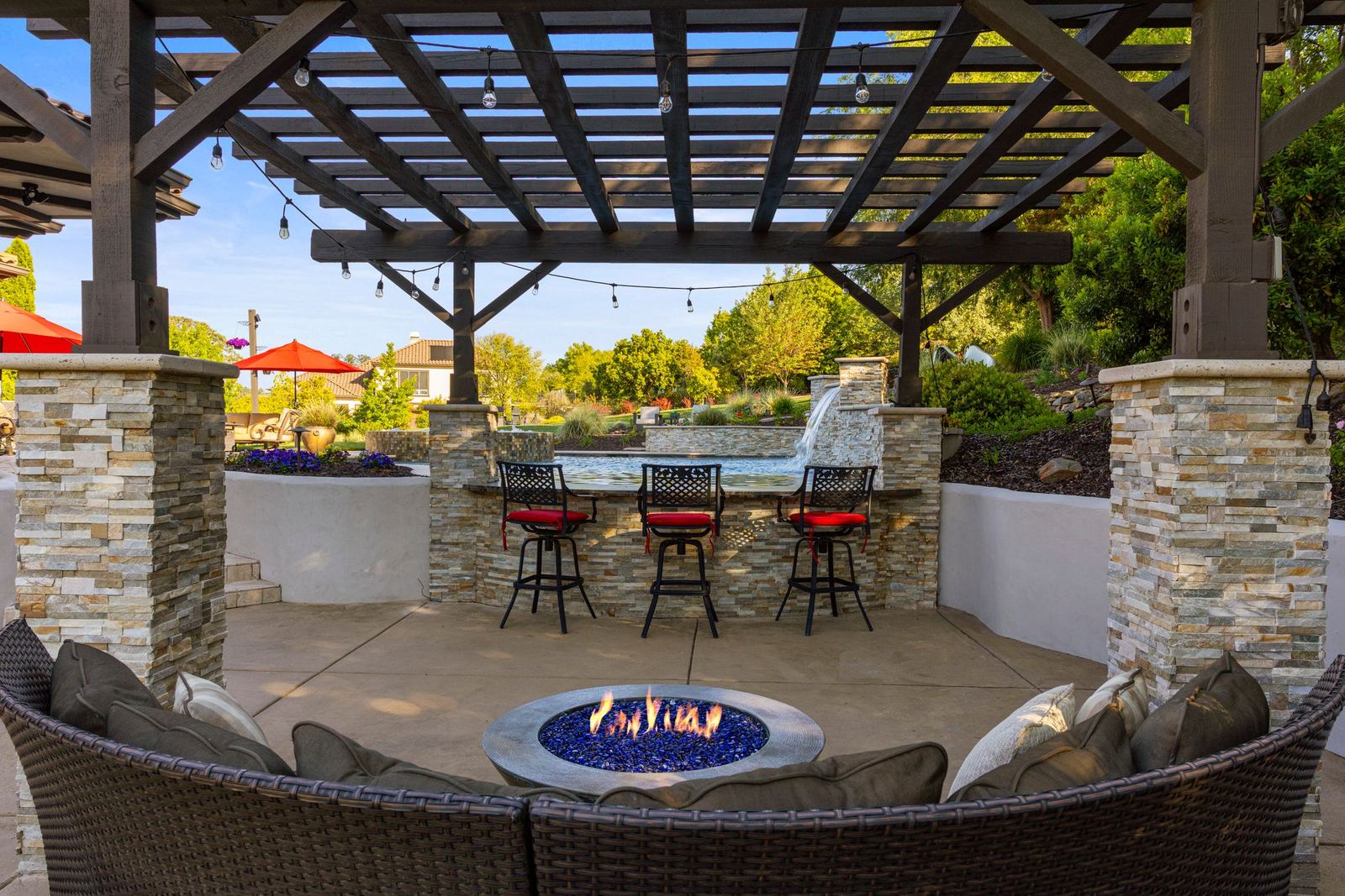 Covered pavilion with firepit and bar seating
