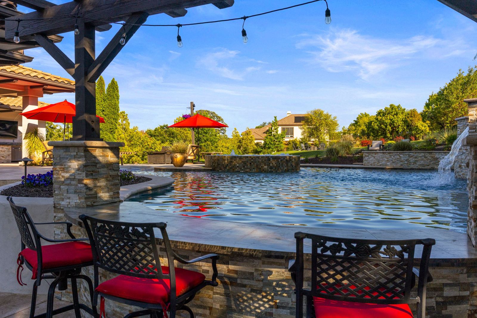 Swim-up bar seating at the pool edge